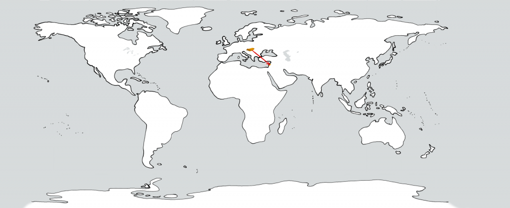 Eine weiße Weltkarte mit zwei goldenen Flecken in der Position von Ungarn und dem Libanon. Ein roter Pfeil führt vom ersten zum zweiten.